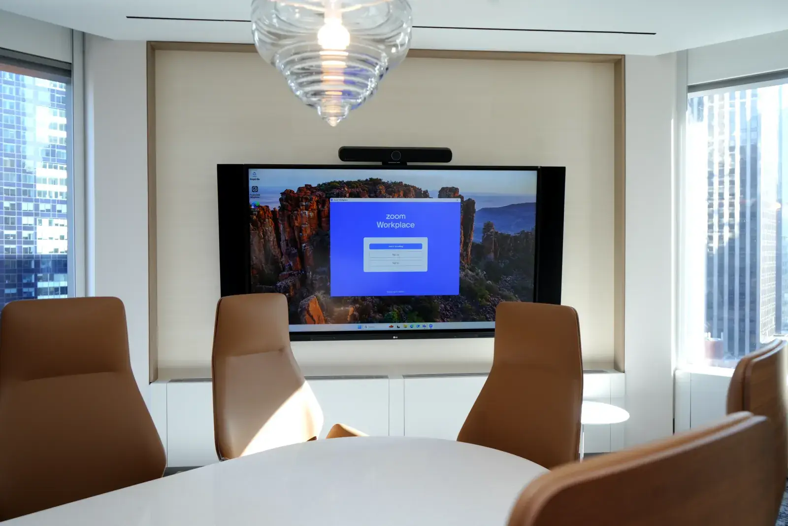 Conference room with display and video bar