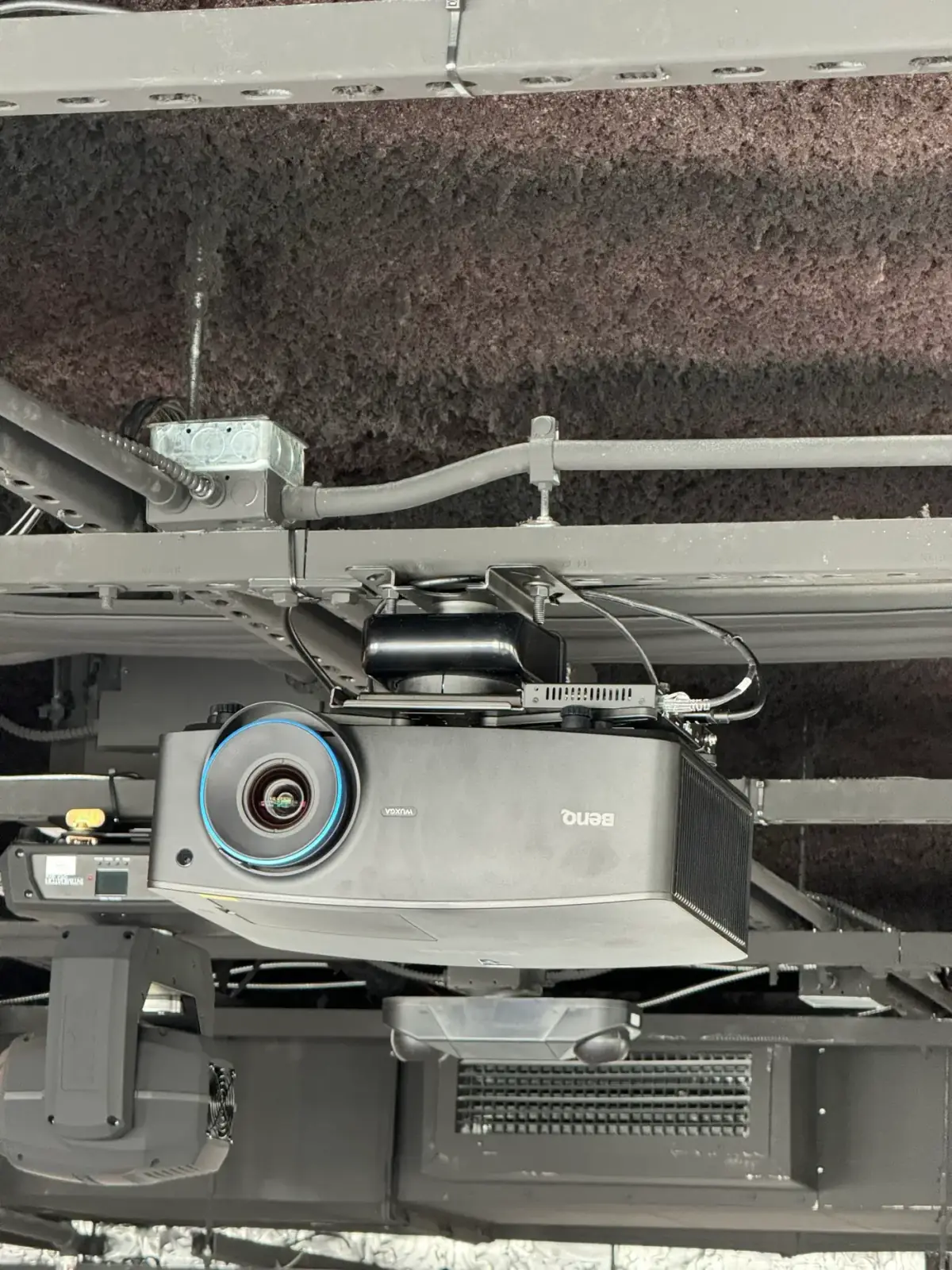 Laser projector rigged on overhead unistrut