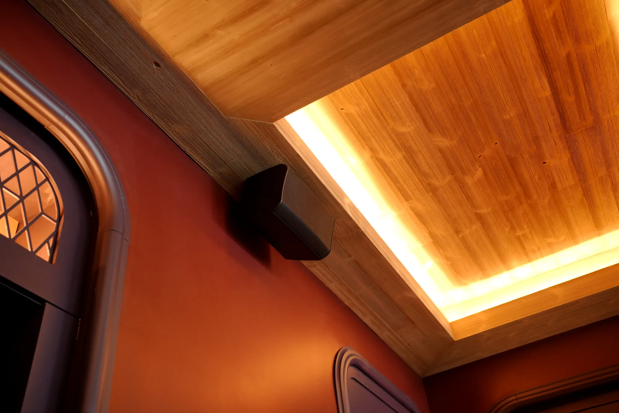 Speaker in a wood-ceiling restaurant